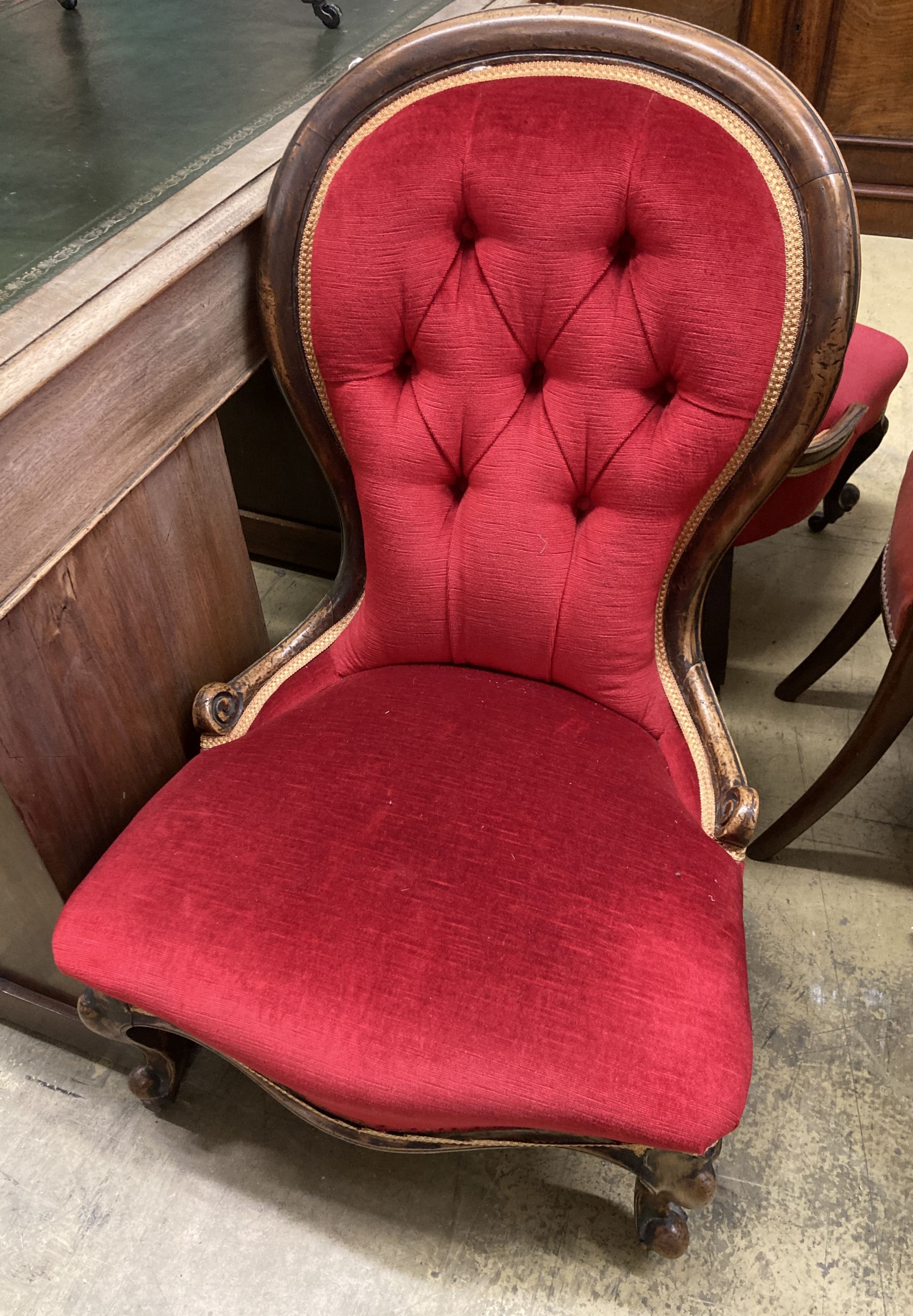 Two Victorian mahogany spoon back nursing chairs